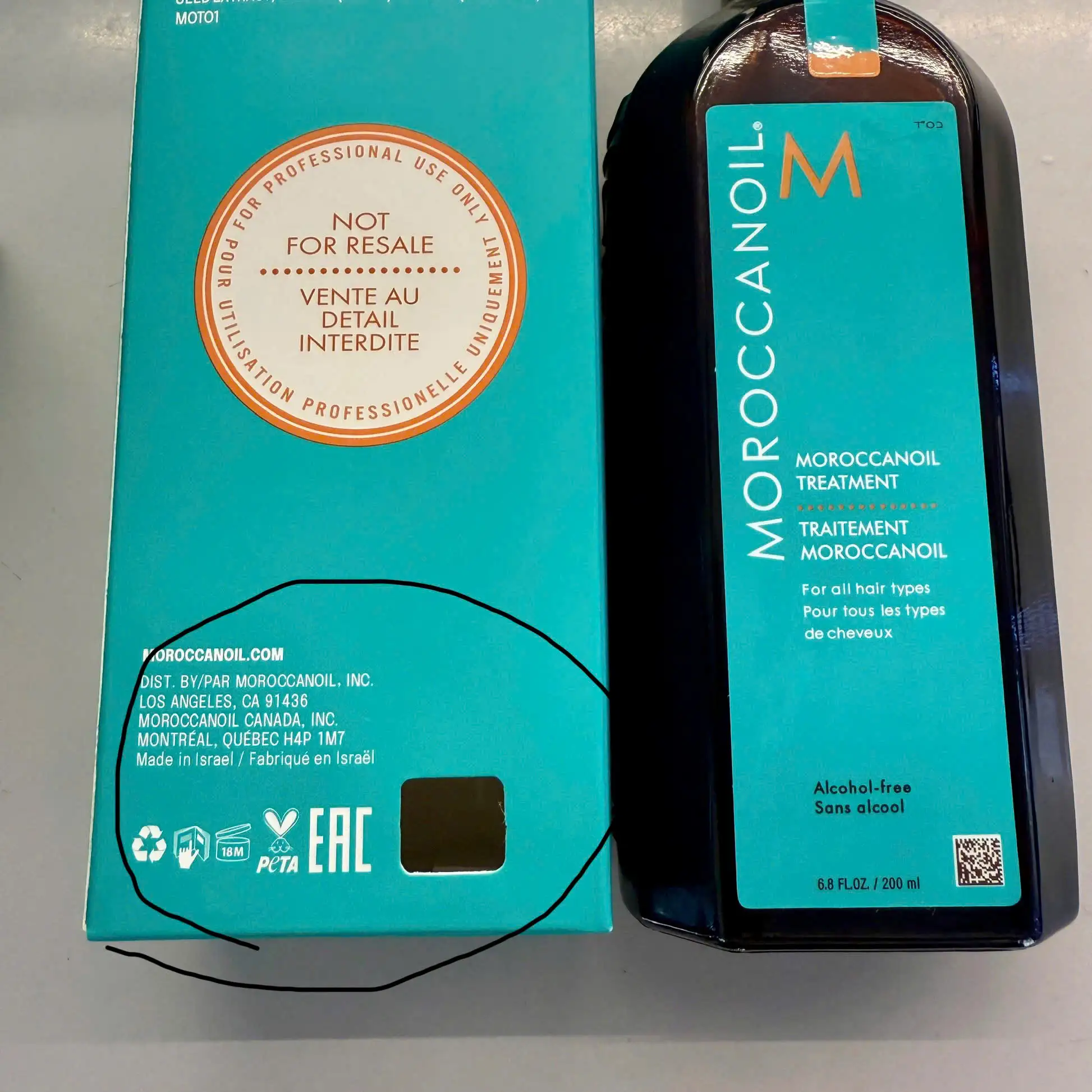 5 Điều Thợ Làm Tóc Ít Biết (Hoặc Thường Không Biết) Về Ký Hiệu Trên Chai Tinh Dầu Dưỡng Tóc Moroccanoil